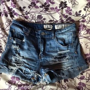 High rise distressed denim shorts